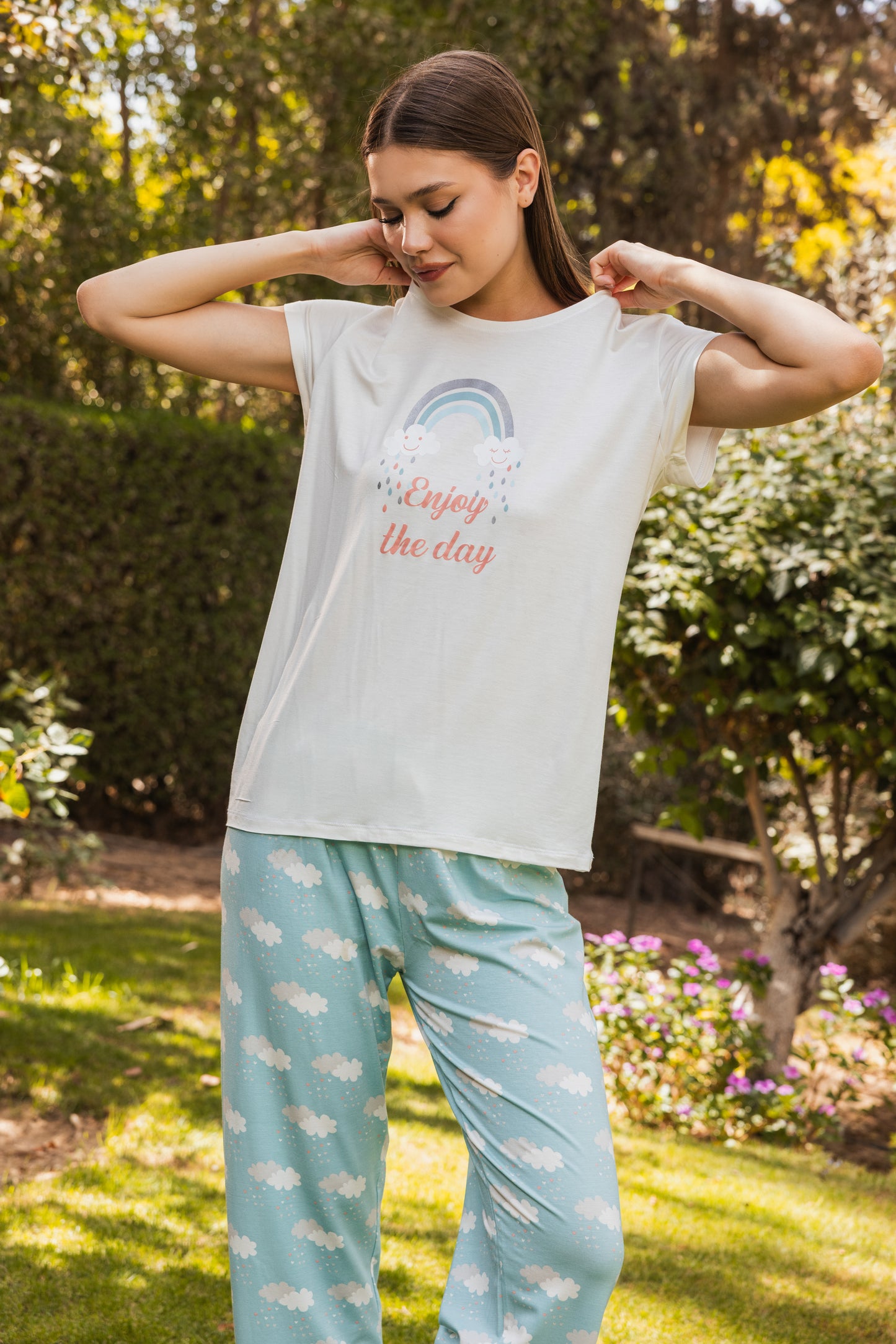 Printed top with zipper, crew neck, and cuffs, and regular pants.