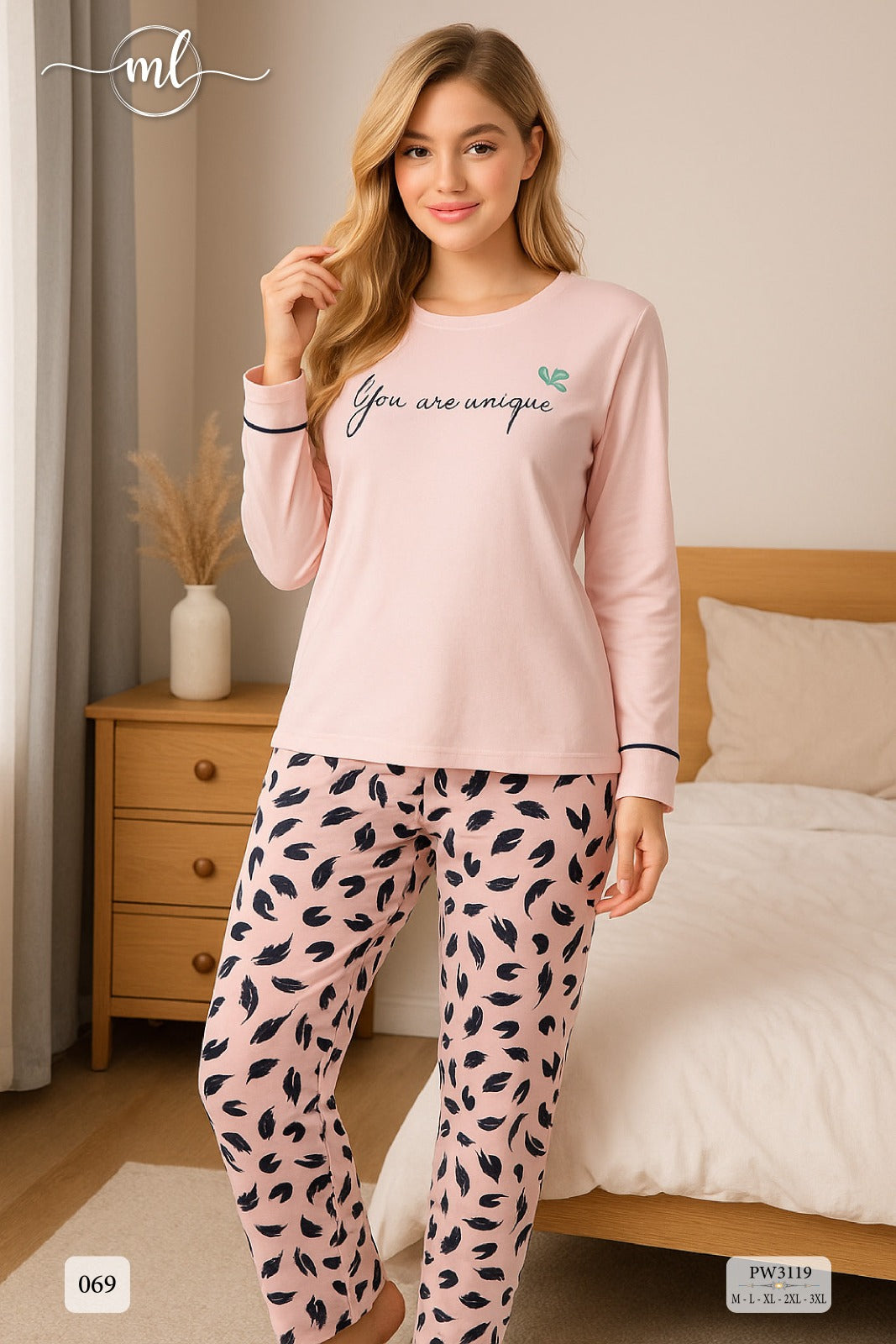 long-sleeve top featuring delicate text embroidery