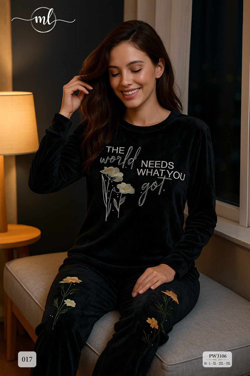 black top featuring elegant satin ribbon embroidery