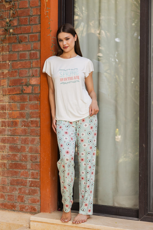 Off-white print top with fan-sleeve round pants
