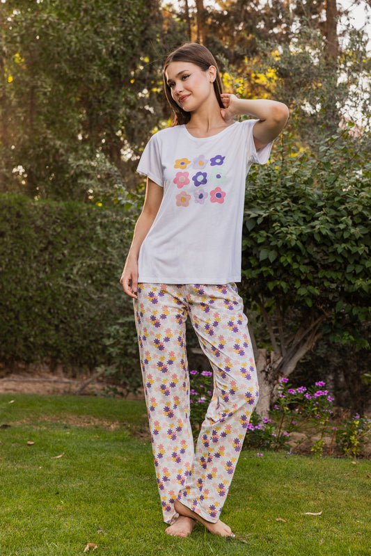 Off-white top with rose print and mauve rose pants