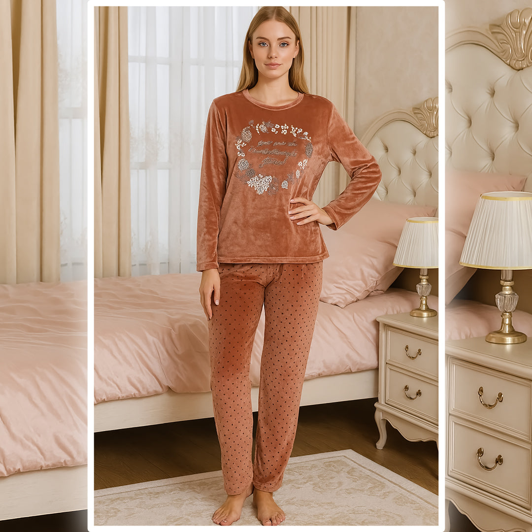 👉 “Raglan-sleeve embroidered top with brick-colored polka-dot pants.”