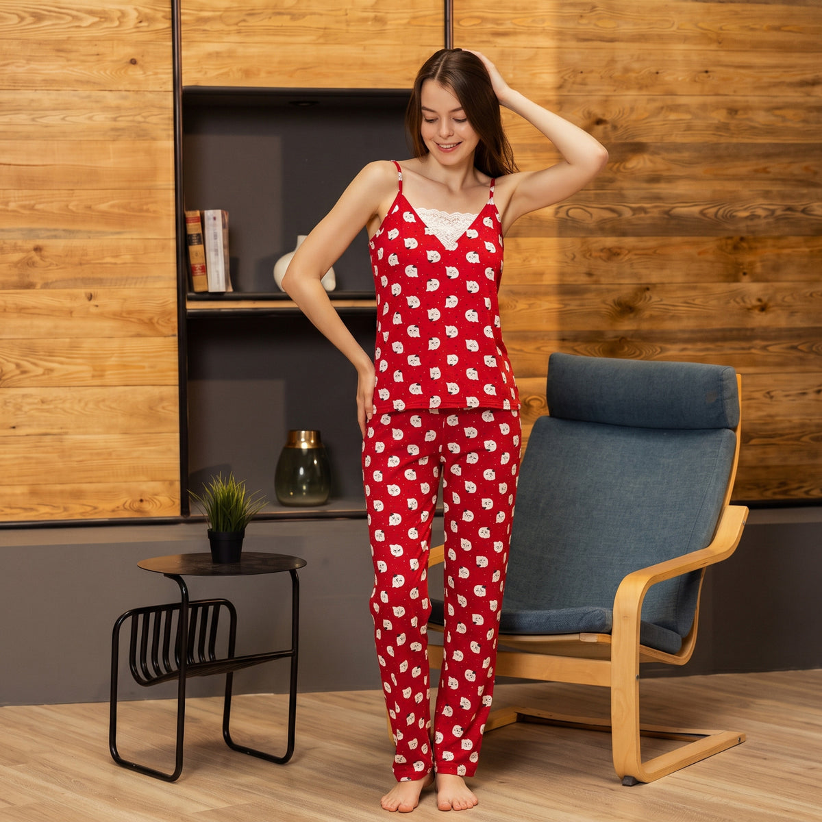 Red strappy pajama with lace details and faces print